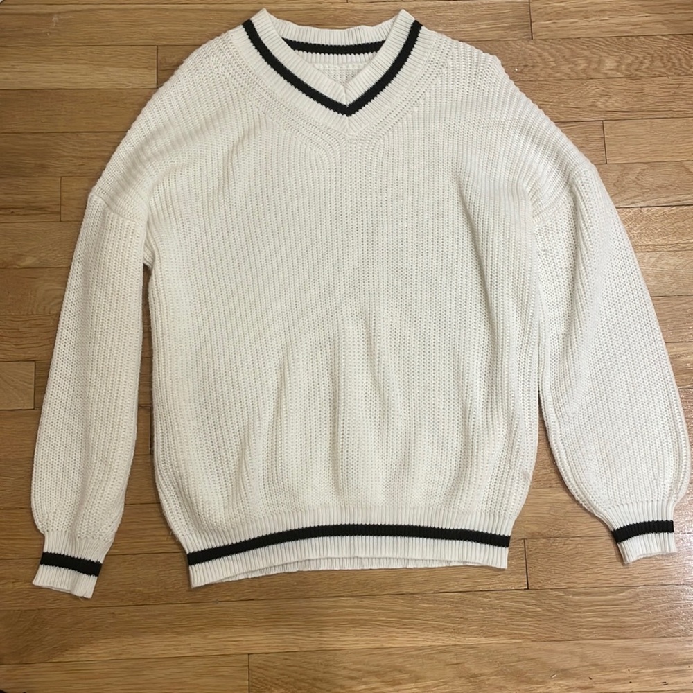 white and black sweater